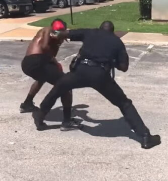 Policía Se Pelea Con Chico En La Calle Con Guantes De Boxeo
